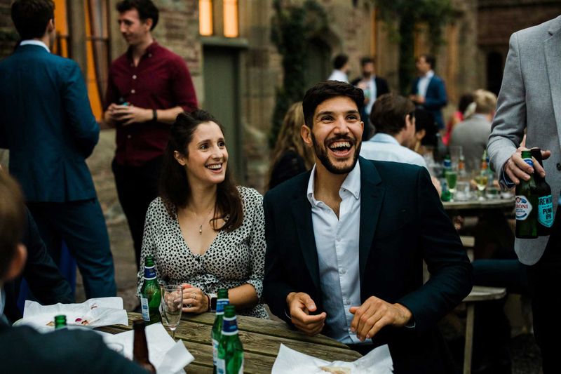 Guests enjoying themselves outside in the Arkwright Courtyard in the summer